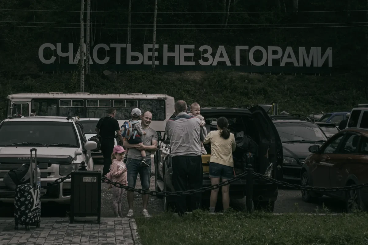 Far East, Russia. Chegdomyn. 2019. The final station of a railway built in part by political prisoners of Stalinist labor camps. The sign reads: “Happiness Is Not Far Away.”