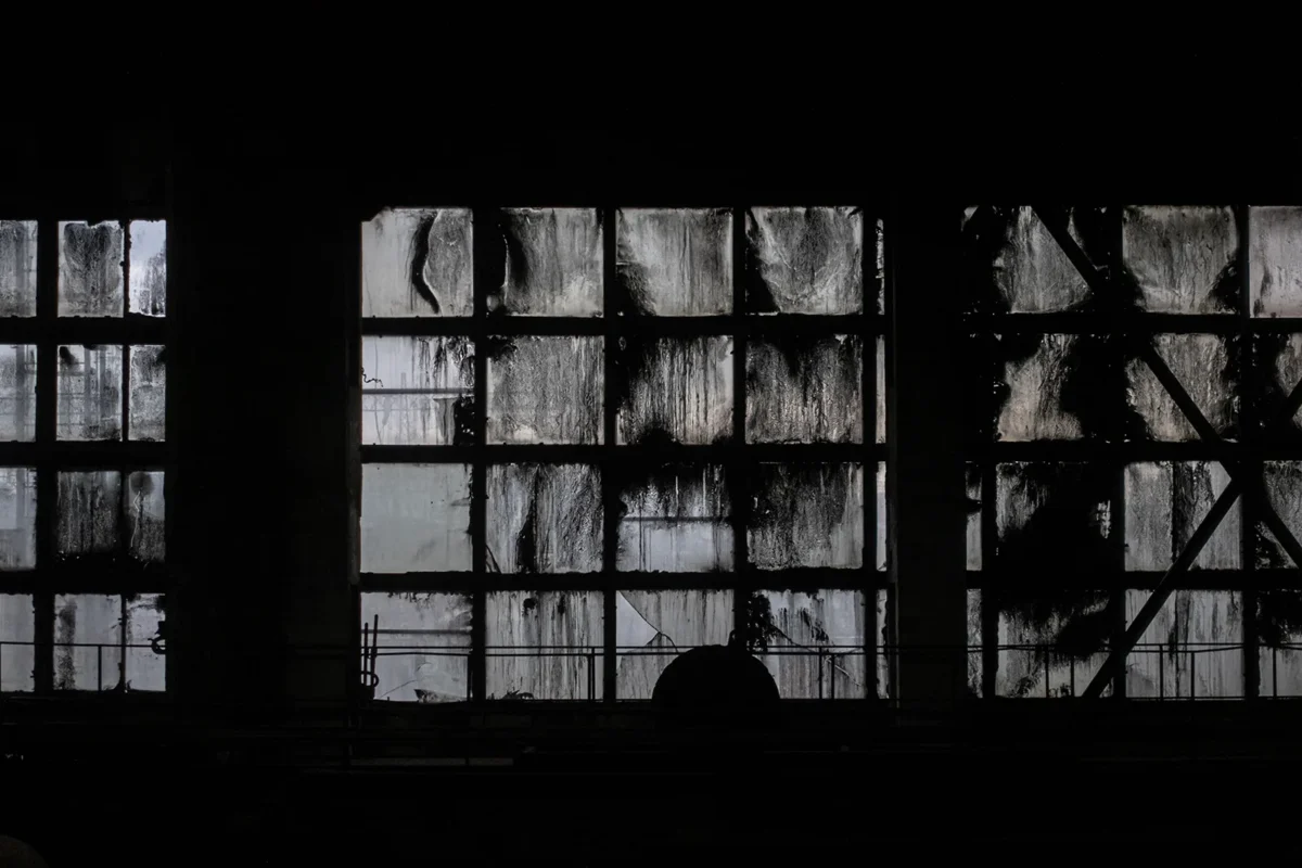 Luchegorsk, Russian Far East, Russia. 2022. Coal dust on the windows of a thermal power station.