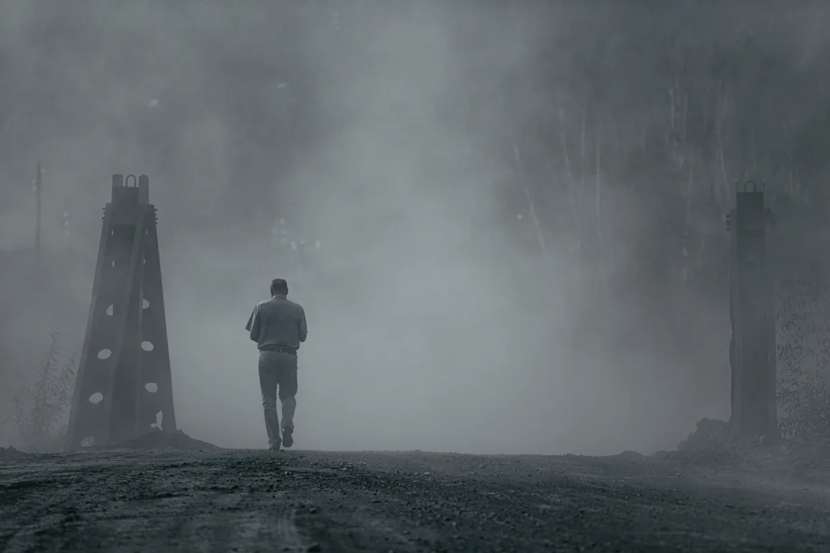 Russian Far East. Chegdomyn, Russia. 2019. Coal dust from trucks carrying coal along the road from the open-pit mines into the settlement.