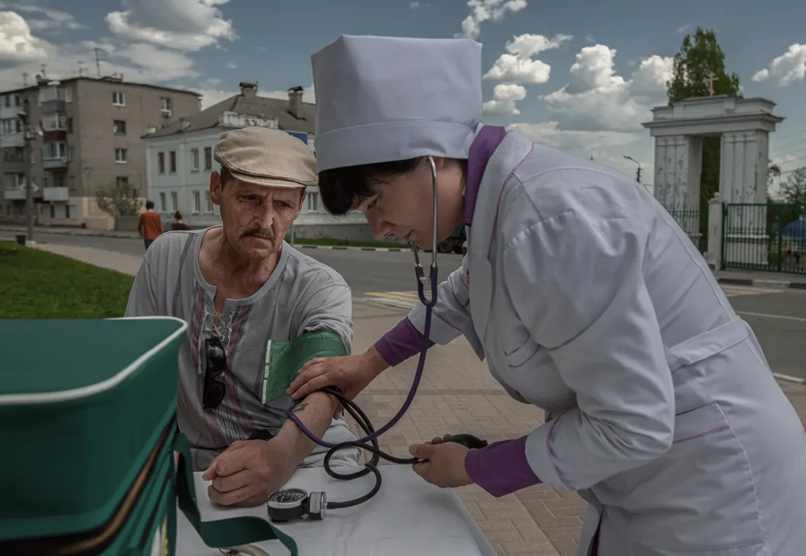 People drink heavily during the holidays, but on this day the city authorities showed special care by deploying street nurses. The man’s blood pressure is 170/110; he refused medication.