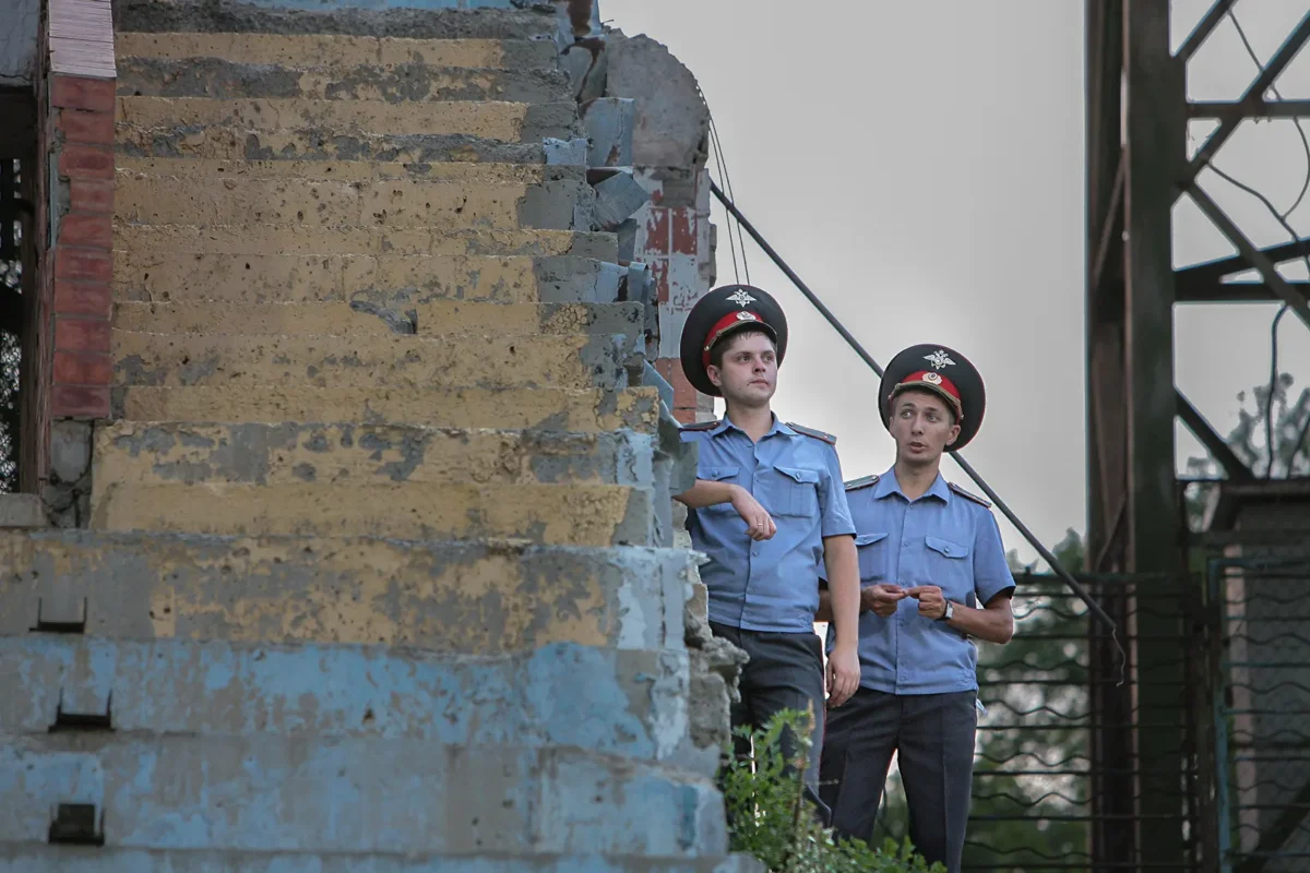 Police at the stadium during a football match.